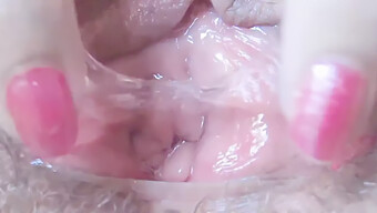 Intense Close-Up Of A Woman'S Genitalia During Fingering